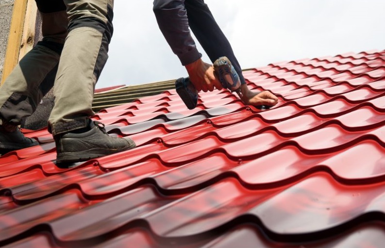 Roofers tiling a new roof — Tough Top Roofing replacement service